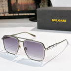 Sunglasses with dark metal frames and violet gradient lenses, rectangular rounded shape