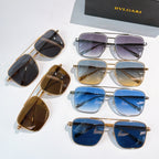 Sunglasses collection with dark, gold, and blue frames and gradient lenses, six pairs shown