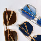 Sunglasses set with brown and blue gradient lenses, gold-toned and silver-toned frames