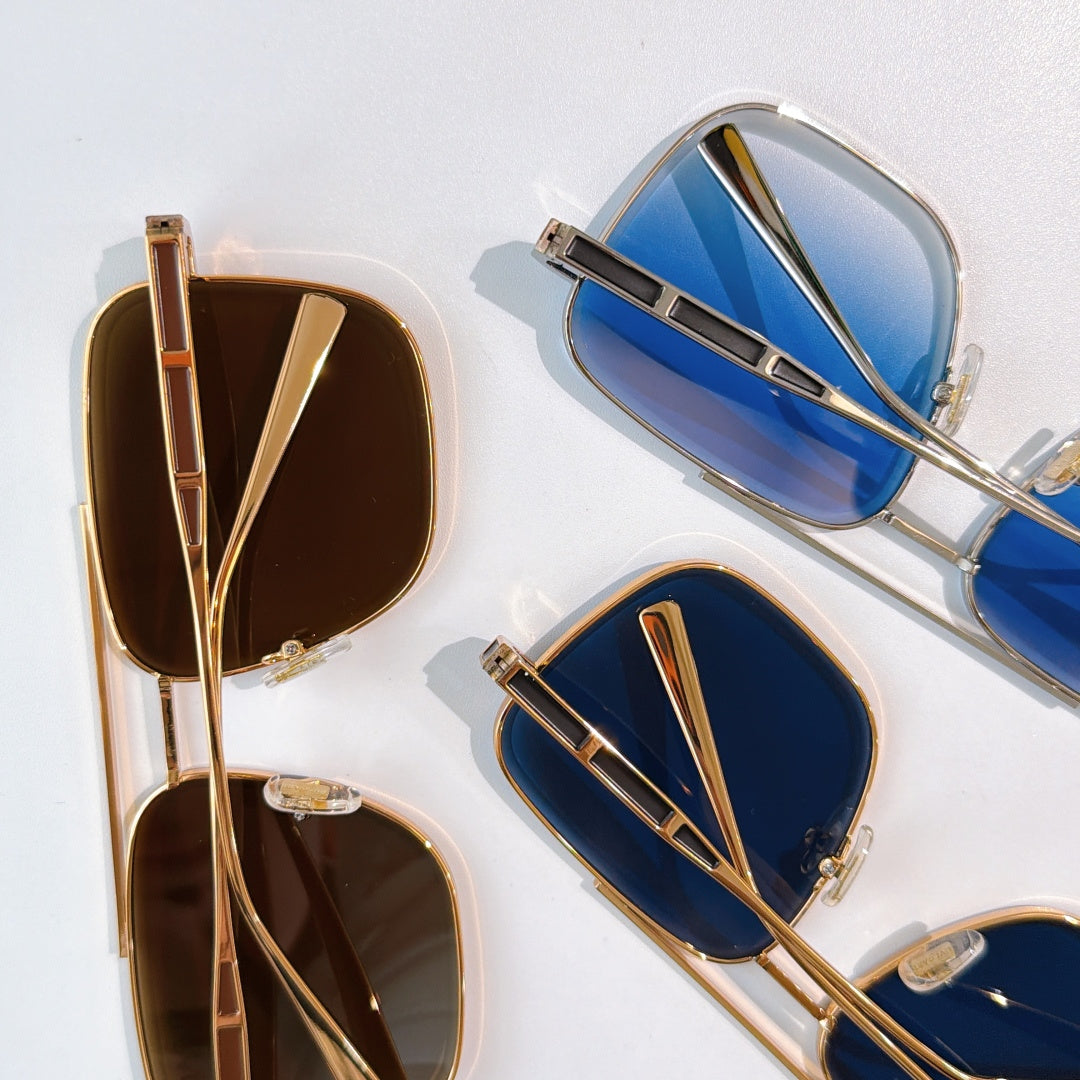 Sunglasses set with brown and blue gradient lenses, gold-toned and silver-toned frames