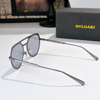 Bvlgari oval sunglasses side view with light blue lenses and thin metal frame