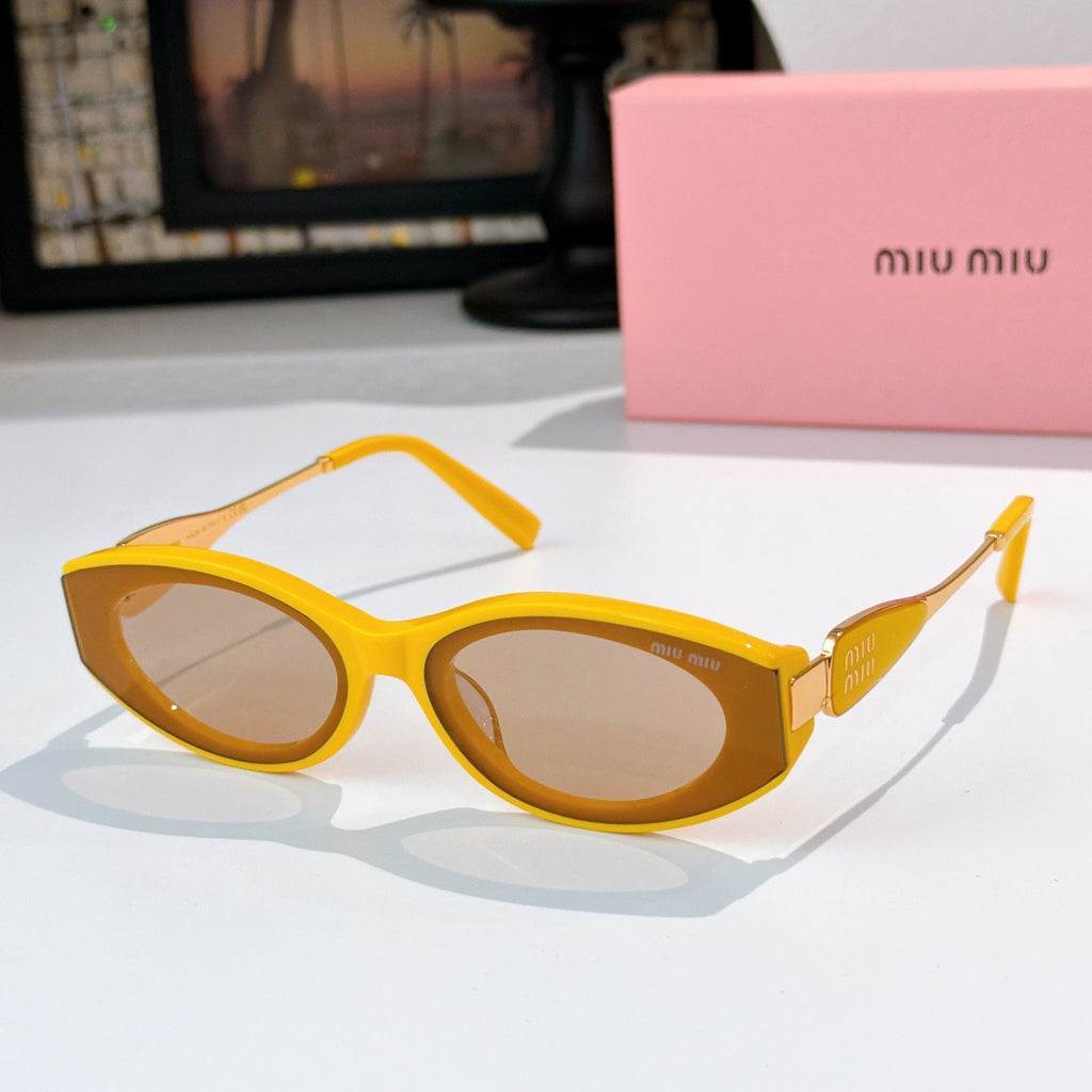 Yellow oval sunglasses with amber-tinted lenses and gold temple details