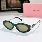 Green oval sunglasses with olive-tinted lenses and silver-toned temple accents