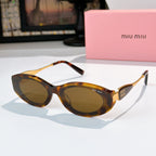 Tortoiseshell oval sunglasses with dark lenses and gold temple accents
