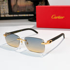 Sunglasses with gold frames and blue-to-amber tinted lenses, rectangular cat-eye shape