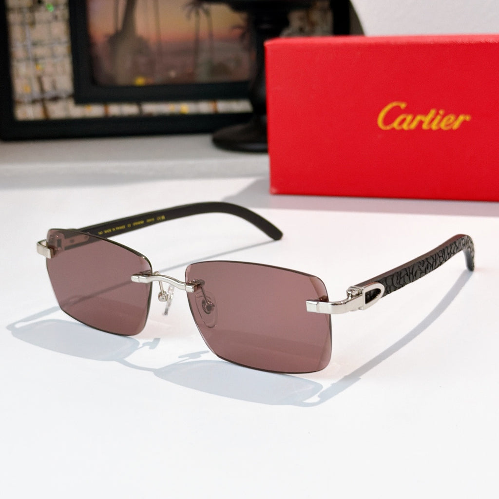 Sunglasses with gold frames and mauve-tinted lenses, rectangular cat-eye shape