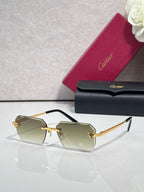 Cartier rectangular eyeglasses with black temples, olive-tinted lenses, gold details