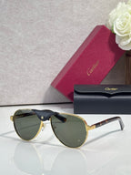 Cartier oval sunglasses with greenish-brown lenses and gold-tone frame