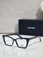 Chanel eyeglasses with black rectangular frame and clear lenses, visible temple logo
