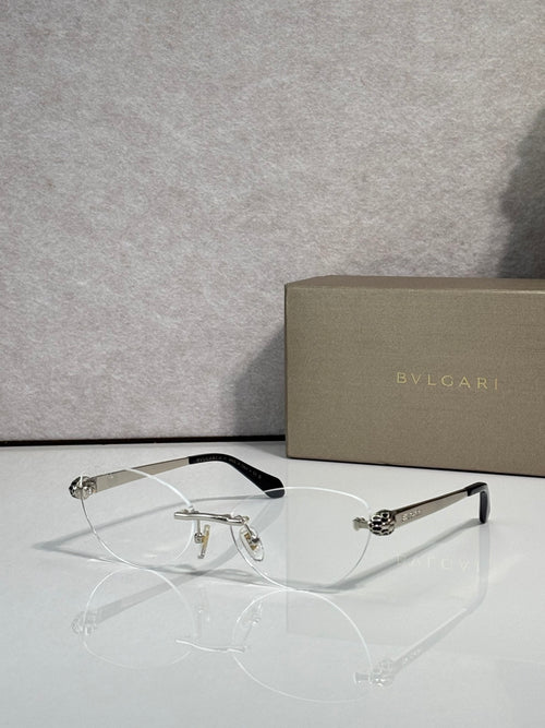 Bvlgari eyeglasses with clear lenses and gold frame, black temple tips