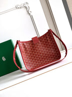 Red crossbody handbag with embossed lattice front and side hand strap