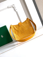 Mustard yellow monogram hobo bag with short handle and crossbody strap