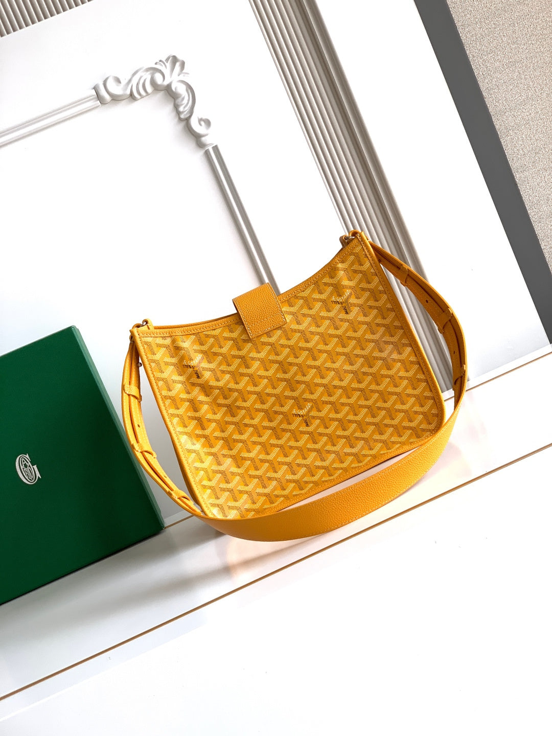Mustard yellow monogram hobo bag with short handle and crossbody strap