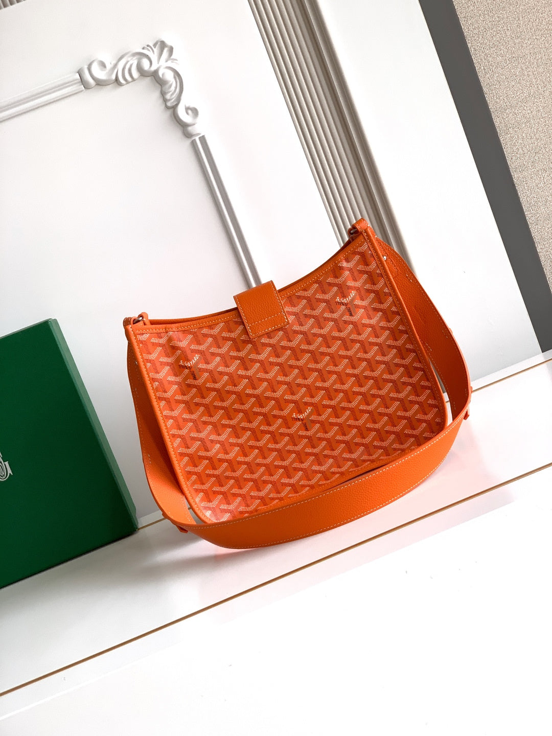 Orange monogram canvas tote bag with leather top handle and shoulder strap