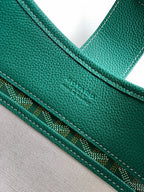 Teal leather strap and stitched edging on patterned canvas Goyard bag