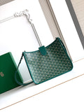 Teal patterned canvas Goyard bag with leather top handle and crossbody strap