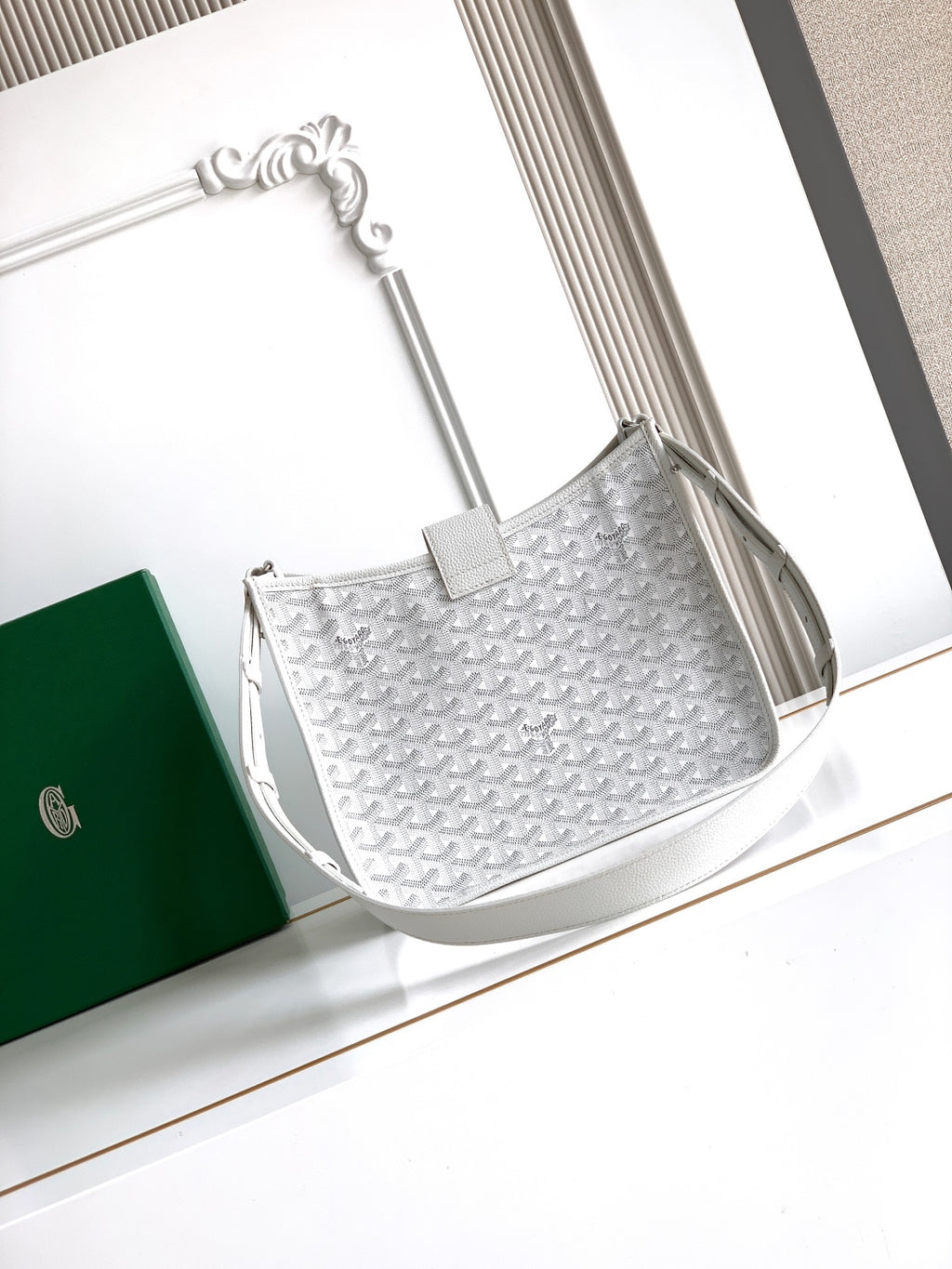 White Goyard tote bag with top handle and wide strap, textured monogram pattern