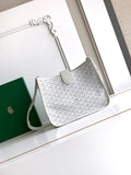 White Goyard tote bag with top handle, flap pocket, and textured pattern