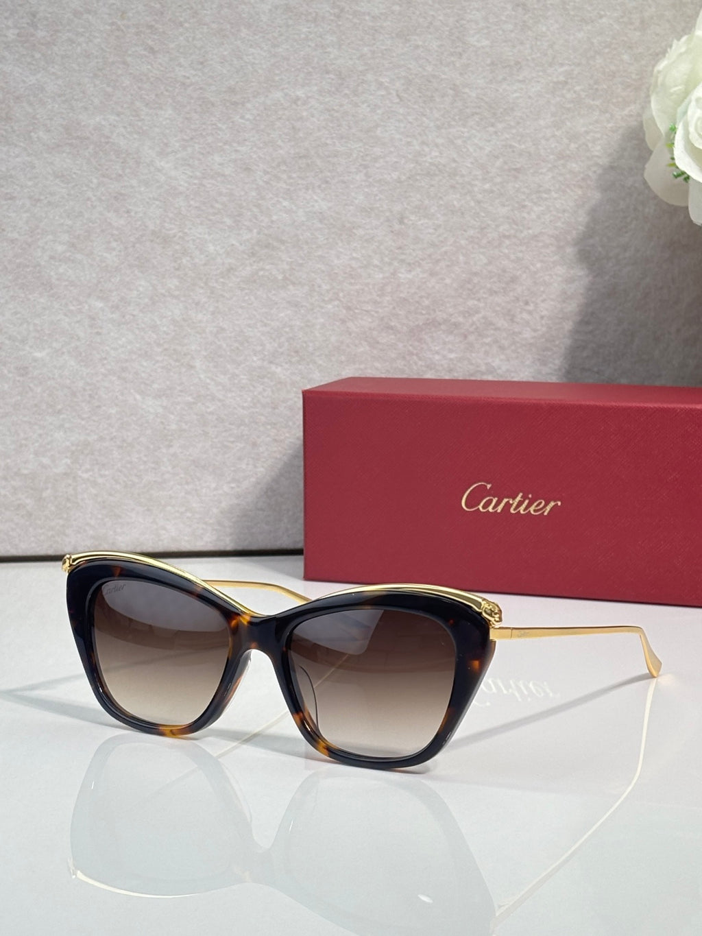 Cartier sunglasses with tortoiseshell frame and gradient tinted lenses