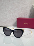 Cartier sunglasses with black frame and gold-tone accents