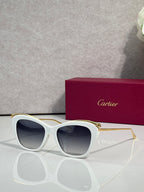Cartier sunglasses with white frame and dark tinted lenses