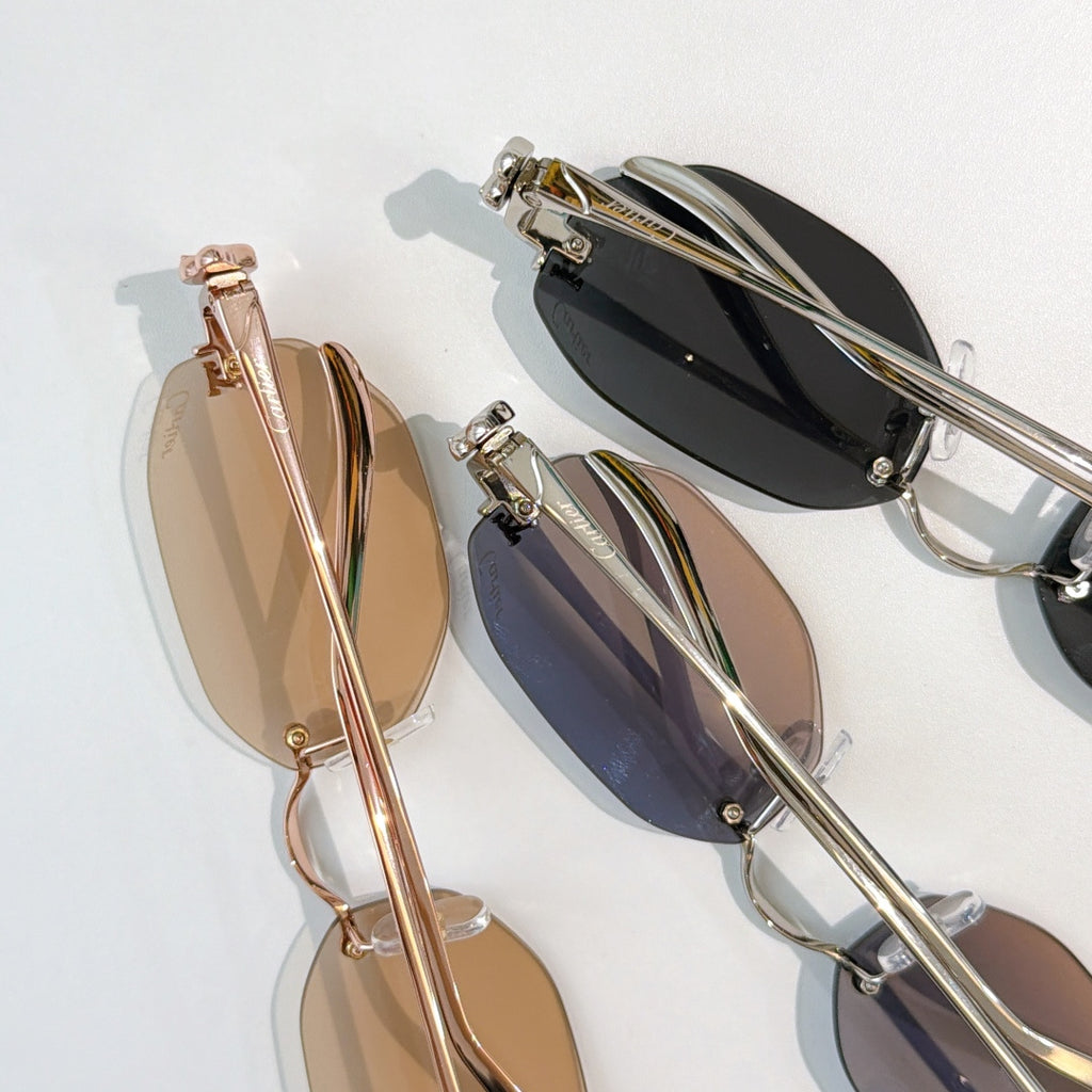 Cartier glasses, close-up of rose-gold and black lens frames