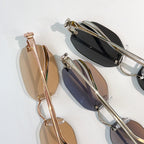 Cartier glasses, close-up of rose-gold and black lens frames