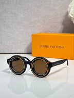 Louis Vuitton sunglasses, black round frames with brown-tinted lenses