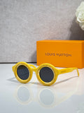 Louis Vuitton sunglasses, yellow round frames with dark lenses