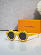 Louis Vuitton sunglasses, yellow round frames with dark lenses