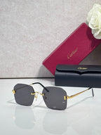 Cartier glasses with dark gray lenses, black frame, and gold-tone details