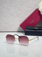 Cartier glasses with pink-tinted lenses, black frame, and gold-tone temples