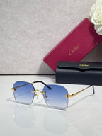Cartier glasses with blue-tinted lenses, black frame, and gold-tone temples