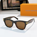 Cat-eye sunglasses with tortoiseshell frames and brown tinted lenses, gold LV logo on temples.