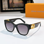 Black cat-eye sunglasses with tortoise temples and gold LV logo, tinted purple lenses