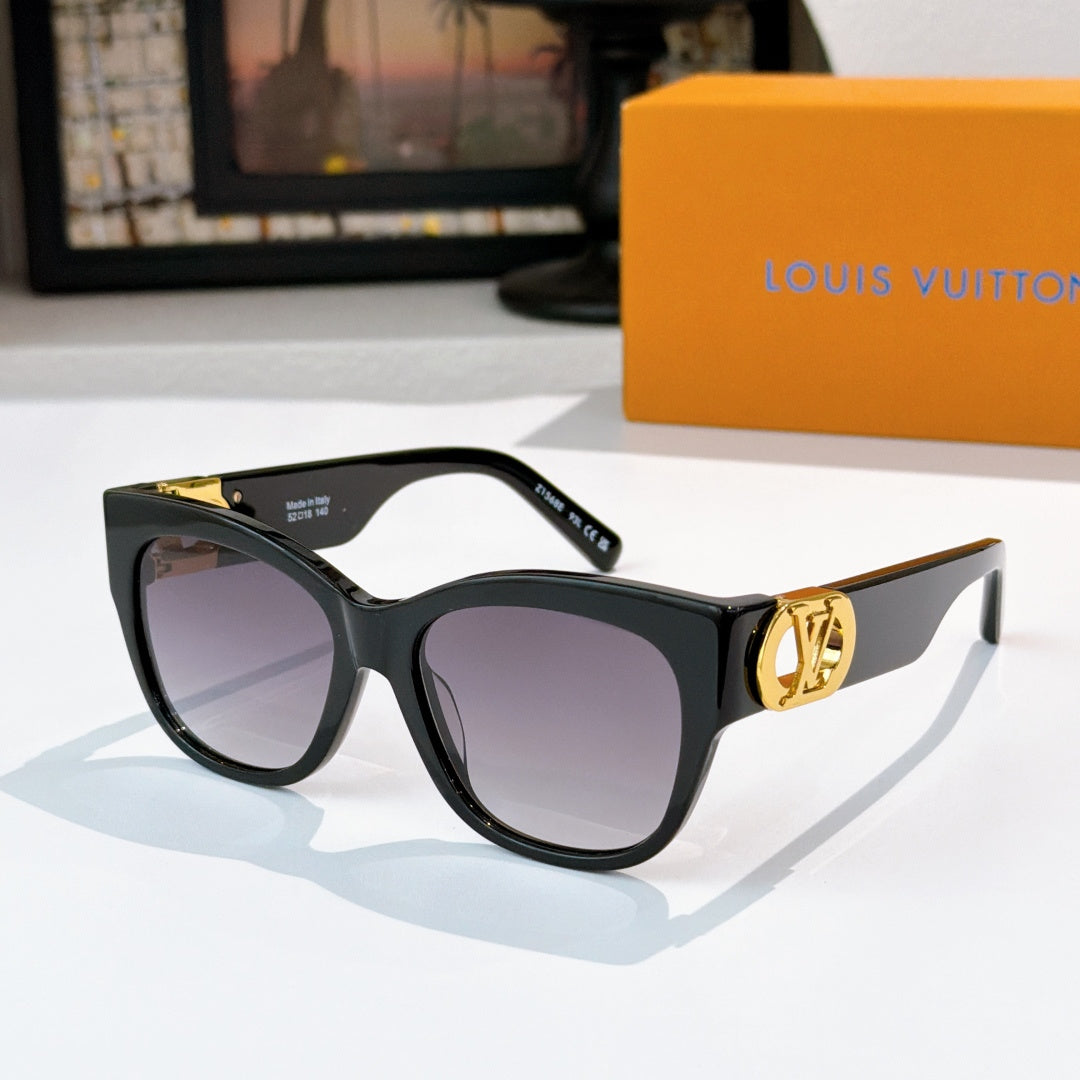 Black cat-eye sunglasses with tortoise temples and gold LV logo, tinted purple lenses