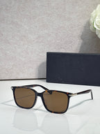 Dior eyeglasses with black frames and brown tinted lenses