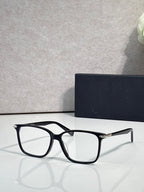 Dior eyeglasses with black rectangular frames and clear lenses