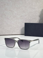 Dior eyeglasses with silver frames and purple tinted lenses