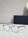 Dior eyeglasses with silver rectangular frames and clear lenses