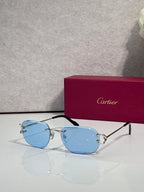 Sunglasses with gold frame and light blue mirrored lenses