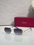 Cartier round-frame sunglasses with smoky purple lenses and gold metal accents