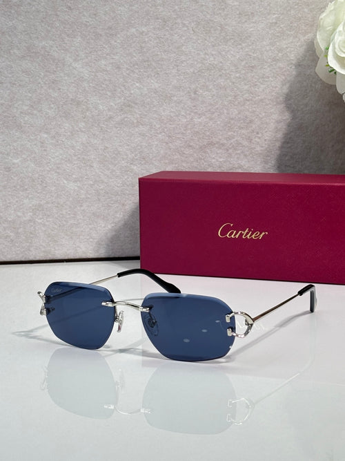 Cartier round-frame sunglasses with blue gradient lenses and black top rim