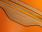Louis Vuitton bag leather interior label with gold zipper and yellow stitched edge