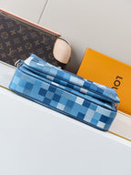 Blue checkered crossbody bag with long zipper and navy side panel