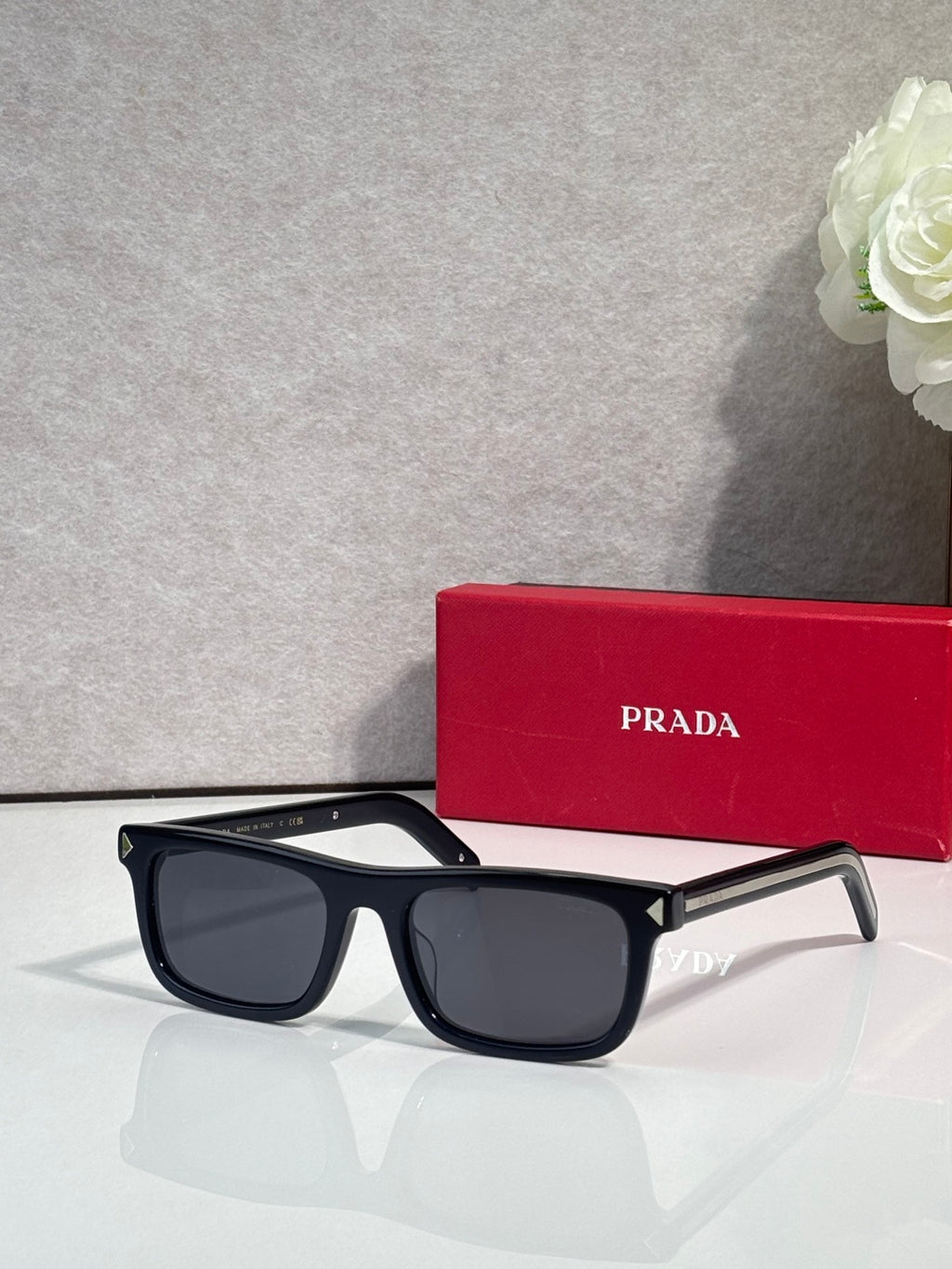 Prada rectangular eyeglasses, black frame, dark gray-tinted lenses