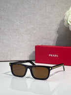 Prada rectangular eyeglasses, black frame, dark brown-tinted lenses