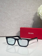 Prada rectangular eyeglasses, black frame, light blue-tinted lenses