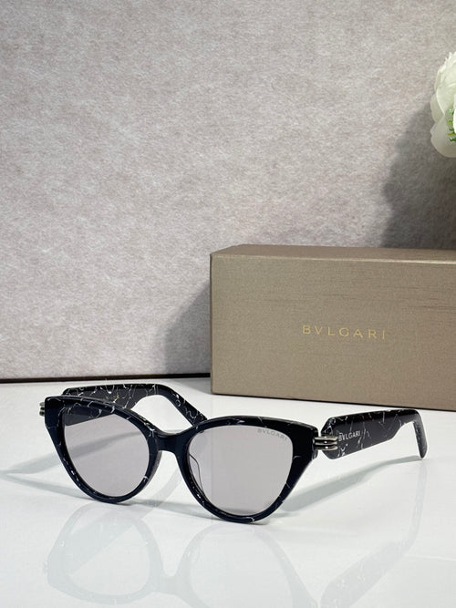 Bvlgari black cat-eye eyeglass frames with gold logo detail on temples