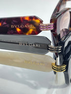 Bvlgari sunglasses close-up of gold hinge with logo detail on temple